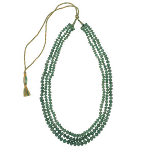 Noor Necklace: A Timeless Statement of Elegance Three graceful layers of green strawberry quartz, each carved in a delicate pumpkin shape, come together in this 34-inch masterpiece. Adjustable with a soft silk string for a perfect fit, this necklace blends sophistication with versatility, making it your go-to piece for any occasion.